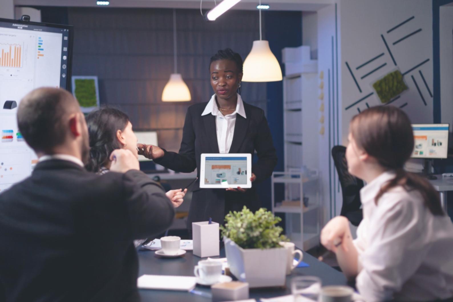 Students collaborating on financial analysis during an interactive workshop session